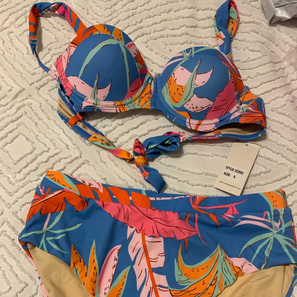 High waisted Swim Suit. Bought but found another I liked more! Sm top/M bottoms.